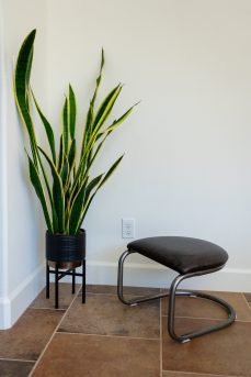 The Lorren Ottoman in Cafe' and Natural Steel