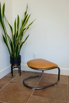 The Lorren Ottoman in Light Honey and Natural Steel